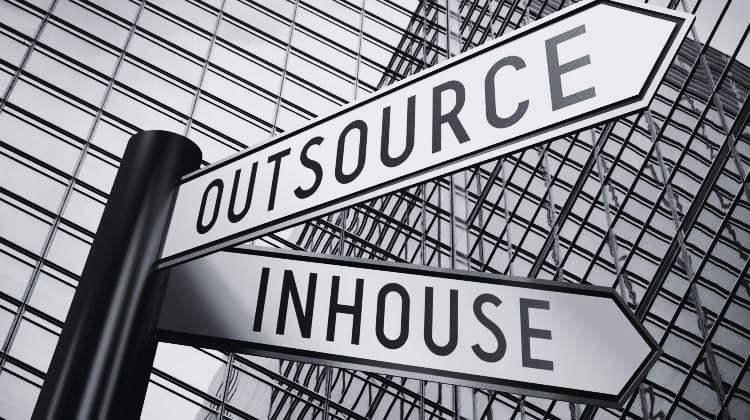 "Outsourcing vs In-House Clinical Trials comparison."